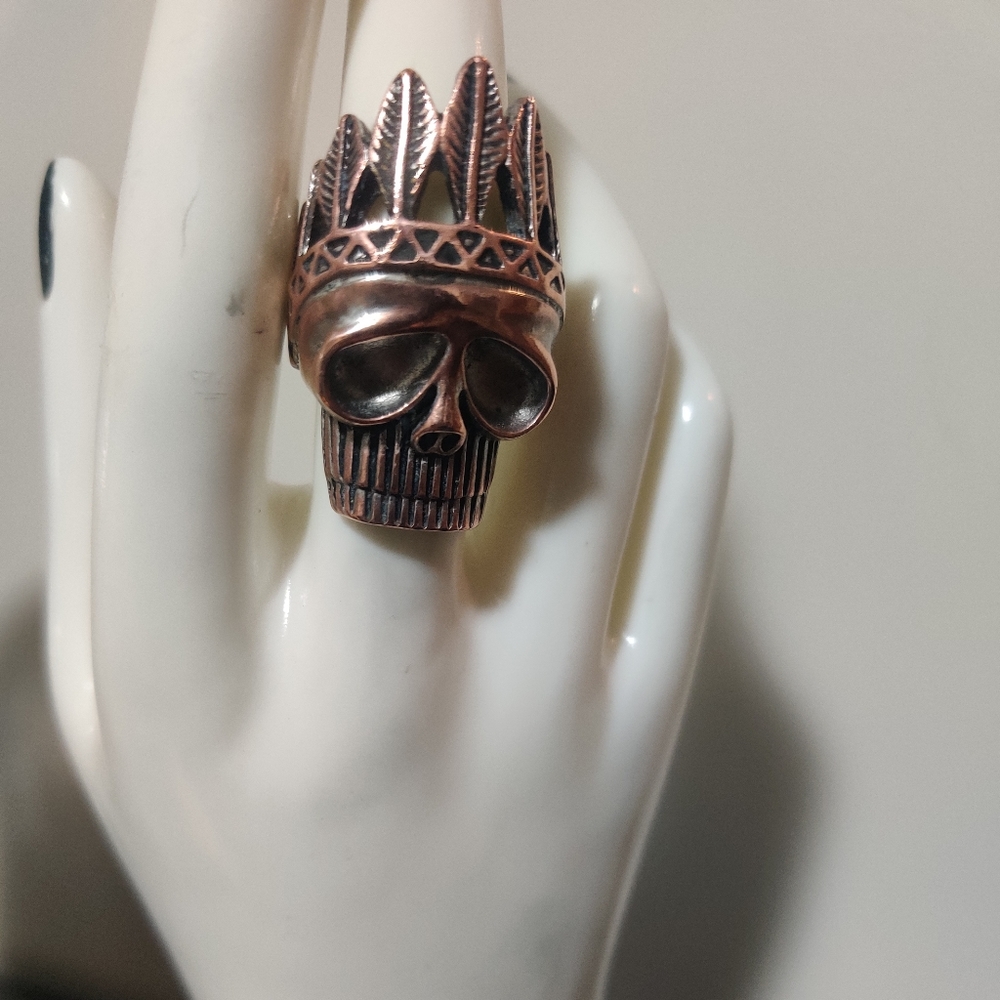 Skull with crown ring